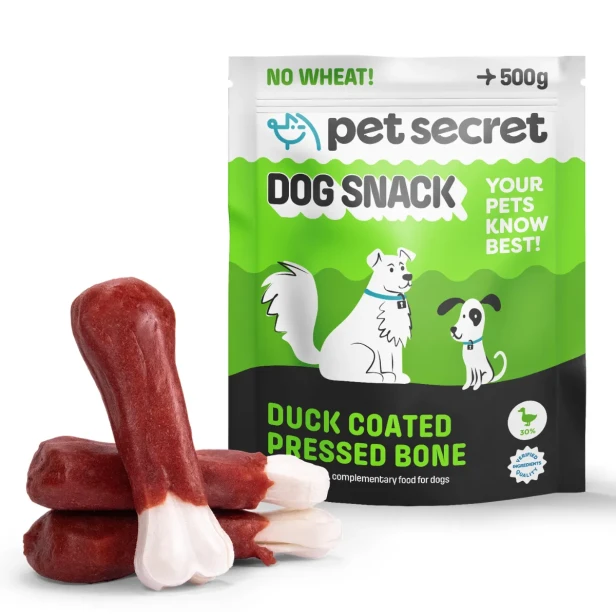 Przysmak dla psa Pet Secret – białe kości prasowane z kaczką 500 g prezentowane wraz z opakowaniem i naturalną formą produktu.