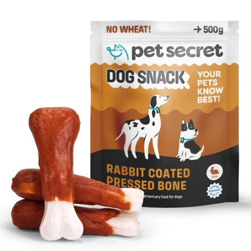 Przysmak dla psa Pet Secret – białe kości prasowane z królikiem 500 g prezentowane wraz z opakowaniem i naturalną formą produktu.